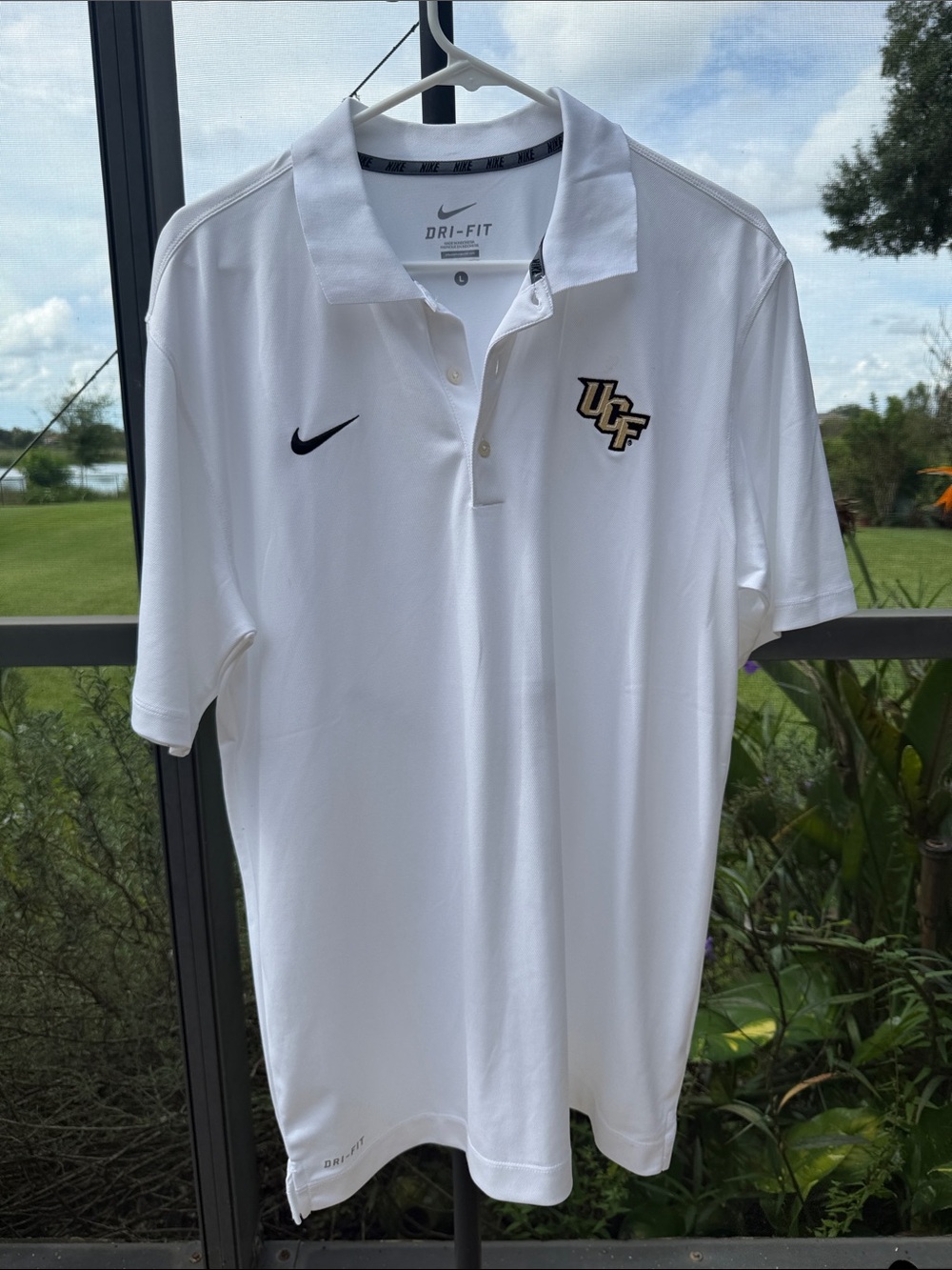 Nike White UCF Polo Shirt with Black Swoosh